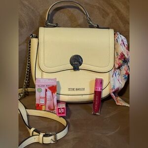 Steve Madden Cream Handbag with lippie and skincare